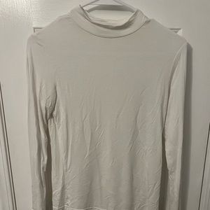 White turtle neck sweat shirt